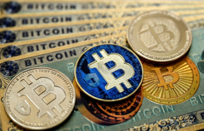 Un nombre croissant d'entreprises misent sur le bitcoin pour diversifier leurs réserves, contrer l'inflation ou attirer les investisseurs, une stratégie à fort potentiel mais à haut risque - Ozan KOSE (AFP) Un nombre croissant d'entreprises misent sur le bitcoin pour diversifier leurs réserves, contrer l'inflation ou attirer les investisseurs, une stratégie à fort potentiel mais à haut risque - Ozan KOSE (AFP)