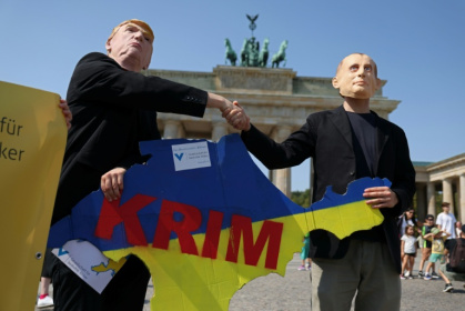 Protesters have already pushed back on the idea of recognising Russia's annexation of Crimea - SEAN GALLUP (AFP)